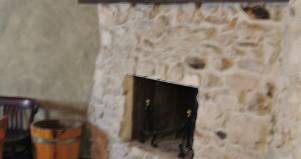 Rivestimento camino in legno albergo Robur Marsorum